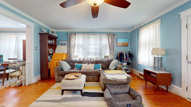 27 School St, Absecon, NJ 08201 - living area with ceiling fan, hardwood / wood-style floors, crown molding, and baseboards