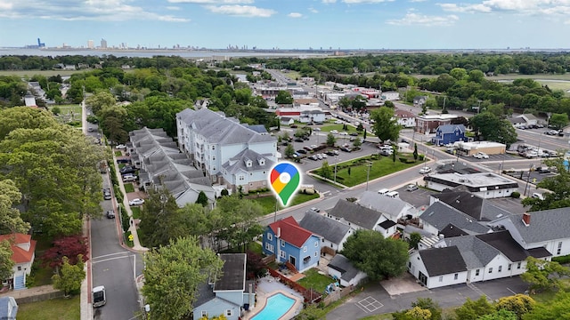 27 School St, Absecon, NJ 08201 - aerial view of residential area with a tree filled landscape and a pool area
