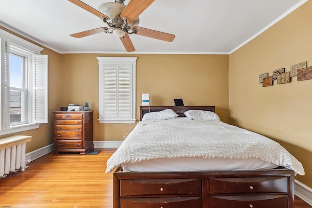 1 S Bartram Ave Unit 3, Atlantic City, NJ 08401 - bedroom featuring crown molding, baseboards, light wood-style floors, and ceiling fan