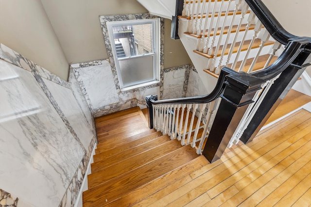 1 S Bartram Ave Unit 3, Atlantic City, NJ 08401 - stairs featuring hardwood / wood-style floors and wainscoting