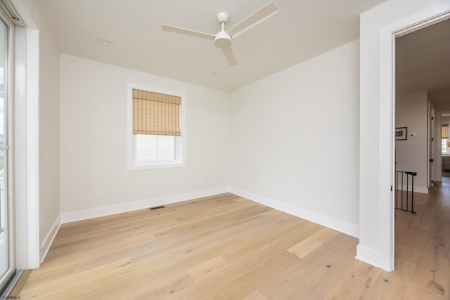 3708 Westminster Ln, Ocean City, NJ 08226 - empty room with light wood finished floors, a ceiling fan, and baseboards