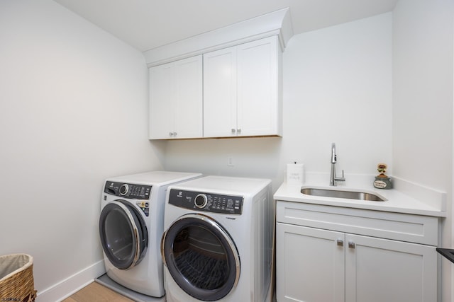 3708 Westminster Ln, Ocean City, NJ 08226 - laundry area with cabinet space, washing machine and clothes dryer, and baseboards