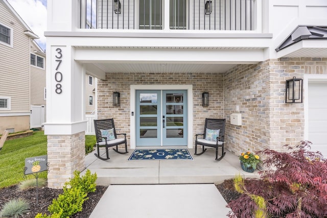 3708 Westminster Ln, Ocean City, NJ 08226 - view of exterior entry with a porch, brick siding, and french doors