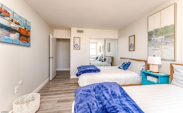 500 Bay Ave Unit 607S, Ocean City, NJ 08226 - bedroom featuring wood finished floors, a closet, and baseboards