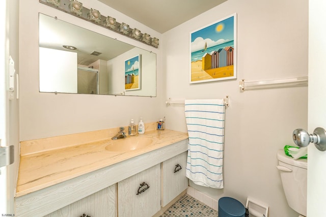 500 Bay Ave Unit 607S, Ocean City, NJ 08226 - bathroom featuring toilet, vanity, tile patterned flooring, and a shower with shower door