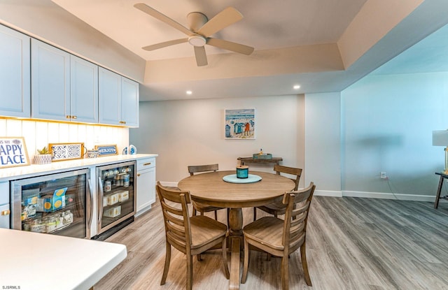 500 Bay Ave Unit 607S, Ocean City, NJ 08226 - dining room with beverage cooler, light wood-type flooring, a ceiling fan, baseboards, and recessed lighting