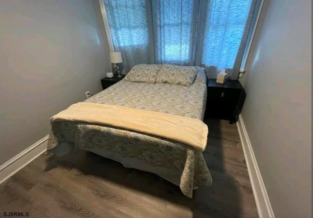804 Delancey Pl Unit 2, Ocean City, NJ 08203 - bedroom with baseboards and wood finished floors