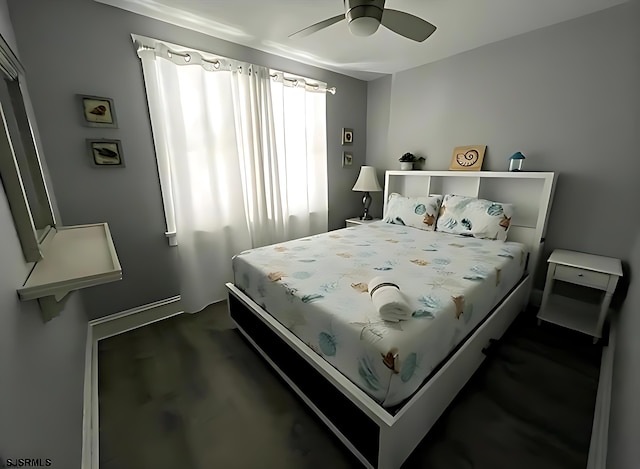 804 Delancey Pl Unit 2, Ocean City, NJ 08203 - bedroom with a ceiling fan and dark carpet
