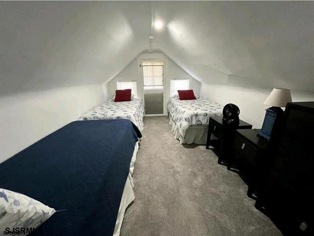 804 Delancey Pl Unit 2, Ocean City, NJ 08203 - bedroom featuring carpet floors and vaulted ceiling
