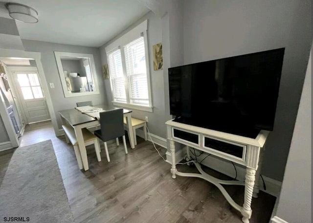 804 Delancey Pl Unit 2, Ocean City, NJ 08203 - dining area with baseboards and wood finished floors