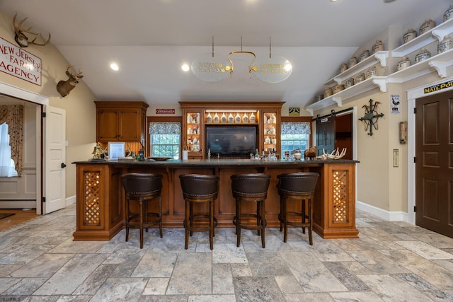3065 N Rte 9, Ocean View, NJ 08230 - kitchen with vaulted ceiling, stone tile floors, plenty of natural light, dark countertops, and open shelves