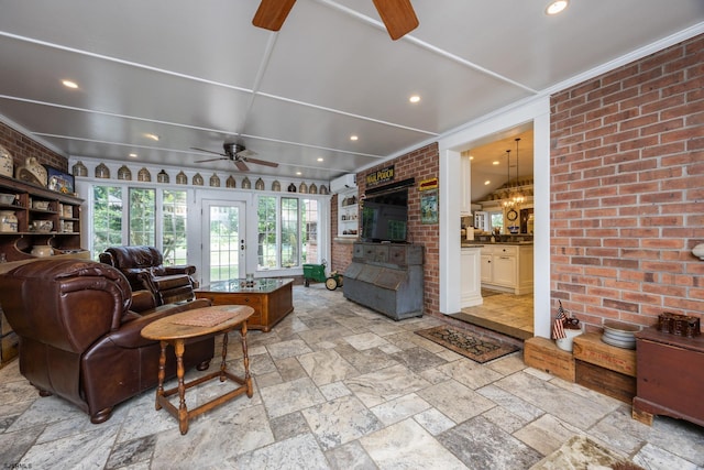3065 N Rte 9, Ocean View, NJ 08230 - living area with a ceiling fan, stone tile floors, brick wall, recessed lighting, and a chandelier