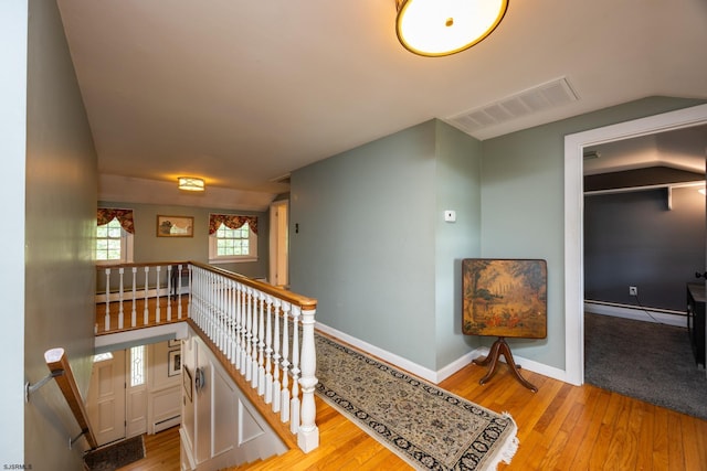 3065 N Rte 9, Ocean View, NJ 08230 - stairway with a baseboard radiator, wood-type flooring, and baseboards