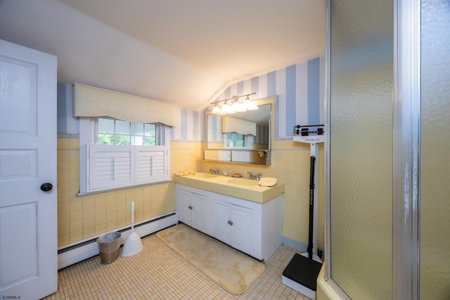 3065 N Rte 9, Ocean View, NJ 08230 - bathroom featuring tile walls, tile patterned flooring, double vanity, a baseboard heating unit, and a shower stall