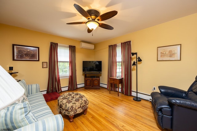 3065 N Rte 9, Ocean View, NJ 08230 - living room with a wall unit AC, ceiling fan, light wood-type flooring, baseboards, and a baseboard heating unit