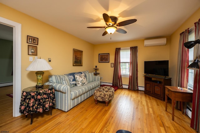 3065 N Rte 9, Ocean View, NJ 08230 - living area featuring a wall unit AC, a ceiling fan, baseboard heating, and light wood-style flooring