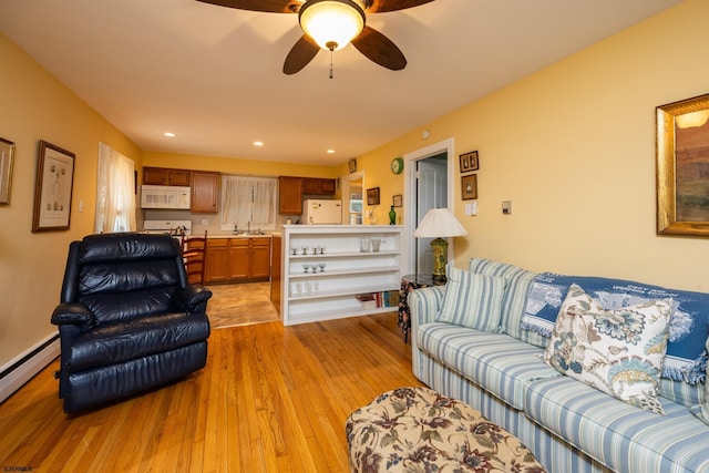 3065 N Rte 9, Ocean View, NJ 08230 - living room featuring light wood-type flooring, a ceiling fan, a baseboard radiator, and recessed lighting