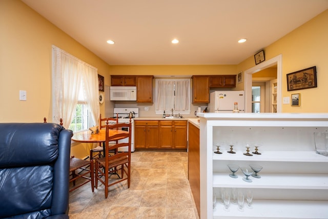 3065 N Rte 9, Ocean View, NJ 08230 - kitchen featuring white appliances, a sink, brown cabinetry, light countertops, and recessed lighting