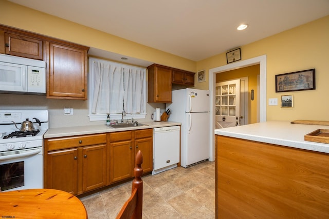 3065 N Rte 9, Ocean View, NJ 08230 - kitchen with white appliances, a sink, light countertops, brown cabinetry, and recessed lighting