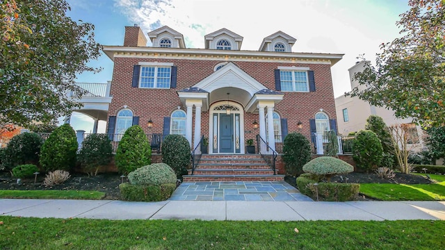 8904 Ventnor Ave, Margate, NJ 08402 - colonial inspired home with brick siding and a chimney