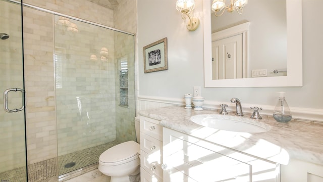 8904 Ventnor Ave, Margate, NJ 08402 - bathroom featuring a stall shower, vanity, toilet, and a chandelier