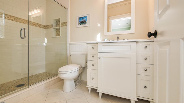 8904 Ventnor Ave, Margate, NJ 08402 - full bathroom featuring toilet, tile patterned floors, a shower stall, vanity, and wainscoting