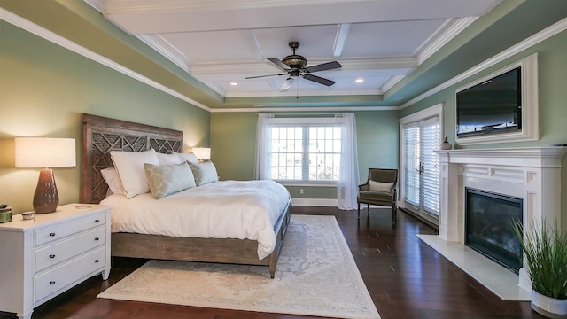 8904 Ventnor Ave, Margate, NJ 08402 - bedroom featuring coffered ceiling, crown molding, dark wood-type flooring, a glass covered fireplace, and ceiling fan