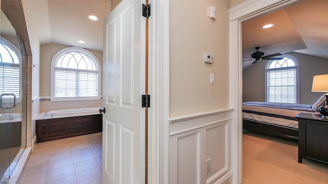 8904 Ventnor Ave, Margate, NJ 08402 - ensuite bathroom with lofted ceiling, a bath, a stall shower, a ceiling fan, and recessed lighting