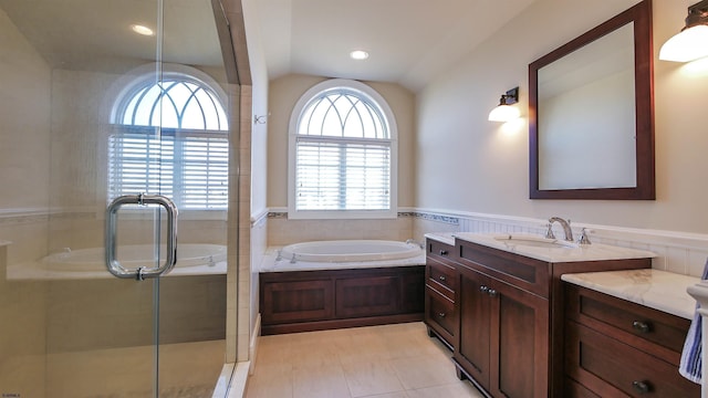 8904 Ventnor Ave, Margate, NJ 08402 - full bathroom featuring a garden tub, a wainscoted wall, a shower stall, vanity, and lofted ceiling