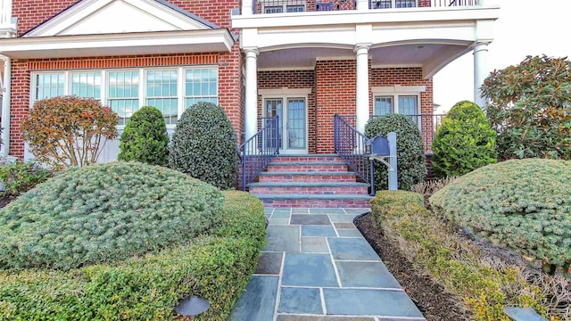 8904 Ventnor Ave, Margate, NJ 08402 - view of exterior entry with brick siding and a porch