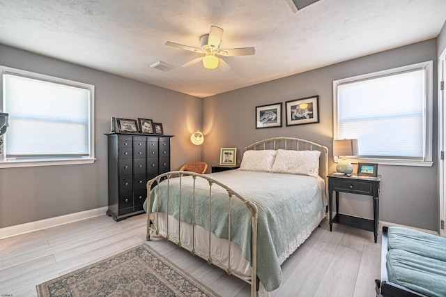 3 Schooner Cv Unit B, Brigantine, NJ 08203 - bedroom with light wood-type flooring, baseboards, and ceiling fan