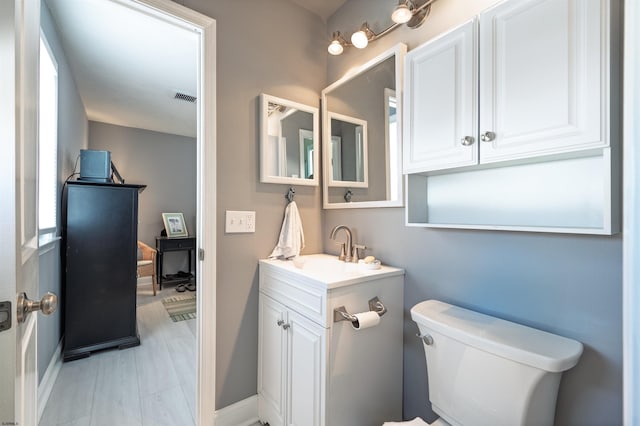 3 Schooner Cv Unit B, Brigantine, NJ 08203 - bathroom with vanity, toilet, and baseboards