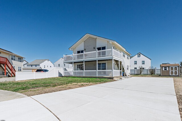 3 Schooner Cv Unit B, Brigantine, NJ 08203 - view of front of house featuring stairway, driveway, and a residential view