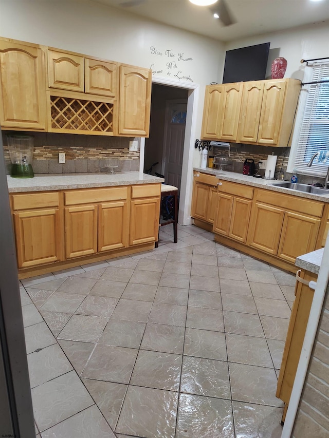 406 W Washington Ave, Pleasantville, NJ 08232 - kitchen with a sink, decorative backsplash, light brown cabinetry, light countertops, and light tile patterned floors