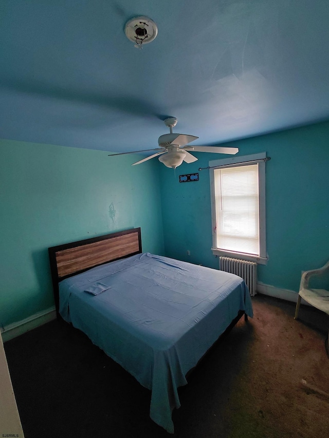 406 W Washington Ave, Pleasantville, NJ 08232 - bedroom with radiator, carpet flooring, baseboards, and a ceiling fan