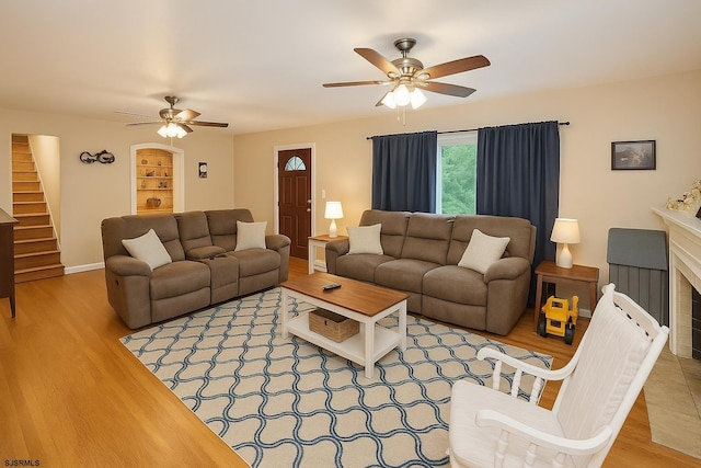 17 Lakeside Dr, Bridgeton, NJ 08302 - living area with a ceiling fan, stairs, wood finished floors, and baseboards