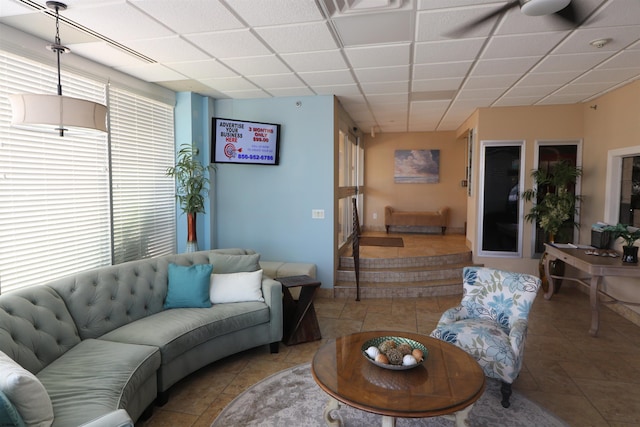 6101 Monmouth Ave Unit 201, Ventnor, NJ 08406 - living area with healthy amount of natural light, a drop ceiling, and tile patterned floors