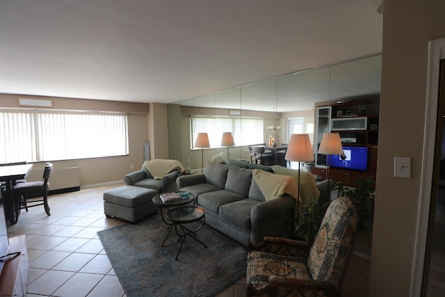 6101 Monmouth Ave Unit 201, Ventnor, NJ 08406 - living room featuring light tile patterned flooring and baseboards