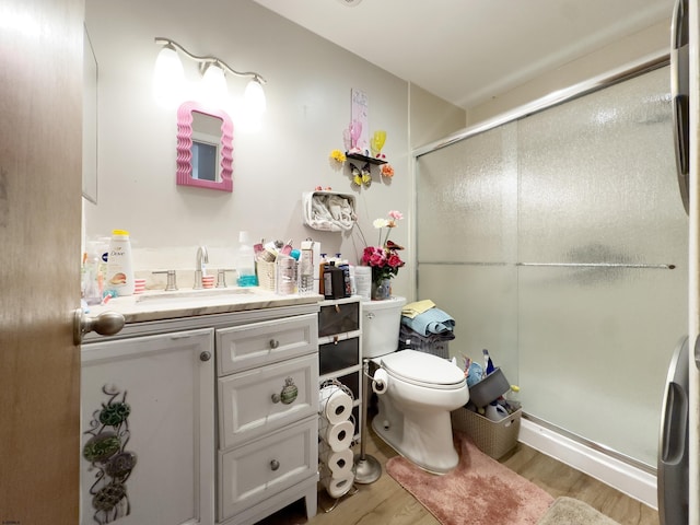 1426 Mediterranean Ave Unit C, Atlantic City, NJ 08401 - bathroom with a shower stall, wood finished floors, toilet, and vanity