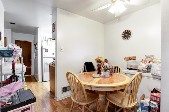 1426 Mediterranean Ave Unit C, Atlantic City, NJ 08401 - dining area with light wood-style flooring and a ceiling fan
