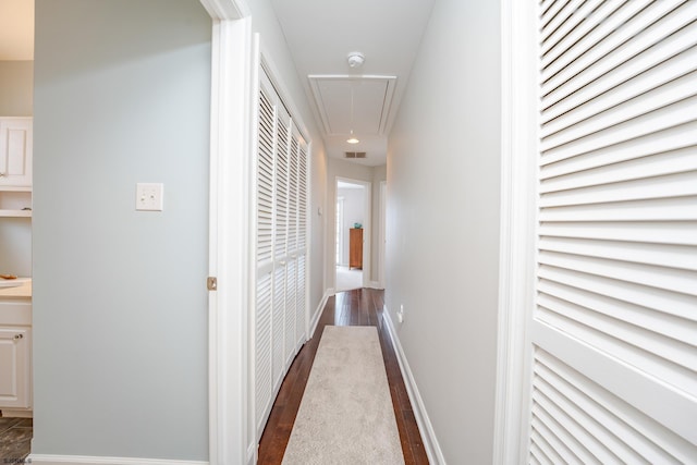1525 Asbury Ave Unit B, Ocean City, NJ 08226 - hallway with attic access, dark wood-style flooring, and baseboards
