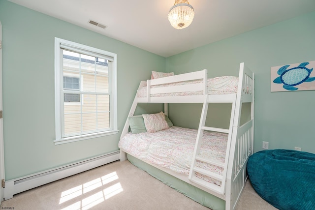1525 Asbury Ave Unit B, Ocean City, NJ 08226 - bedroom featuring a baseboard radiator, carpet floors, and a chandelier