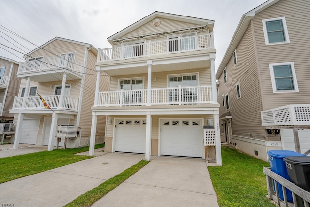 1525 Asbury Ave Unit B, Ocean City, NJ 08226 - view of front of house with an attached garage, concrete driveway, a balcony, and a front lawn