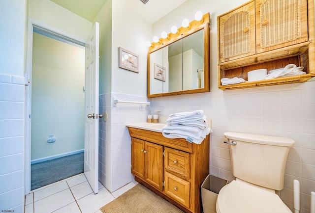 18 E 14th St Unit 2, Ocean City, NJ 08226 - bathroom with vanity, tile walls, tile patterned floors, and toilet