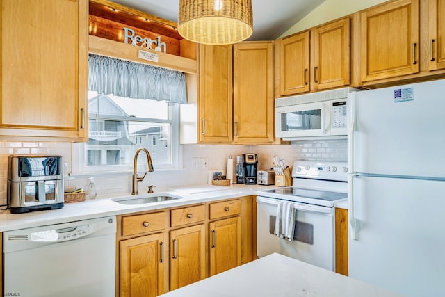 18 E 14th St Unit 2, Ocean City, NJ 08226 - kitchen featuring white appliances, a sink, decorative backsplash, light countertops, and lofted ceiling