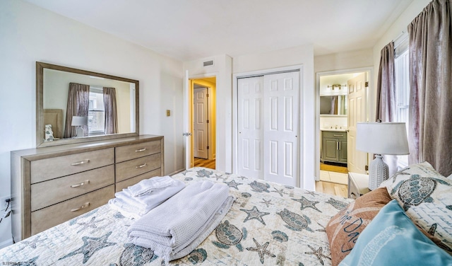 16 E 14th St Unit 1, Ocean City, NJ 08226 - bedroom featuring multiple windows, a closet, and connected bathroom