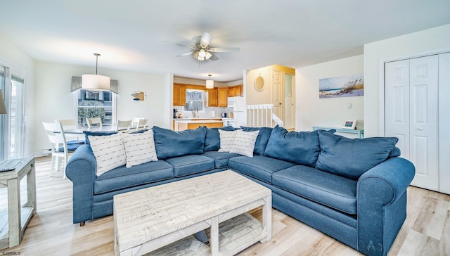 16 E 14th St Unit 1, Ocean City, NJ 08226 - living area with a ceiling fan and light wood-type flooring