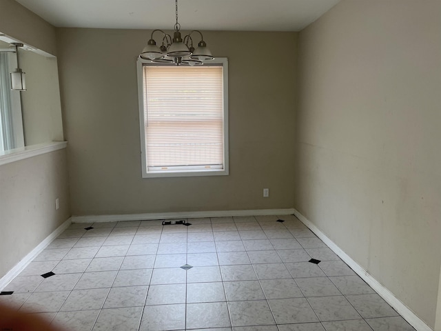 2510 Ridge Ave, Egg Harbor Township, NJ 08234 - empty room featuring a chandelier, baseboards, and light tile patterned floors
