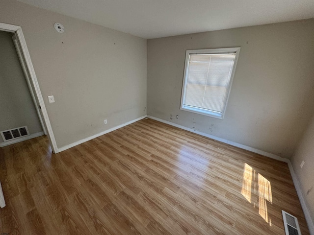 2510 Ridge Ave, Egg Harbor Township, NJ 08234 - unfurnished room with wood finished floors, baseboards, and a smoke detector