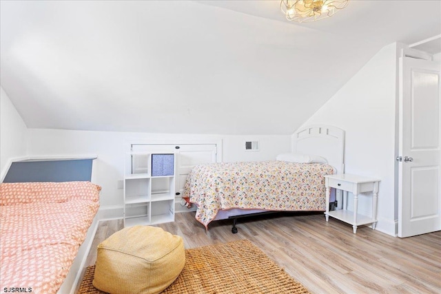 7 N Surrey Ave, Ventnor, NJ 08406 - bedroom featuring vaulted ceiling, wood finished floors, and baseboards